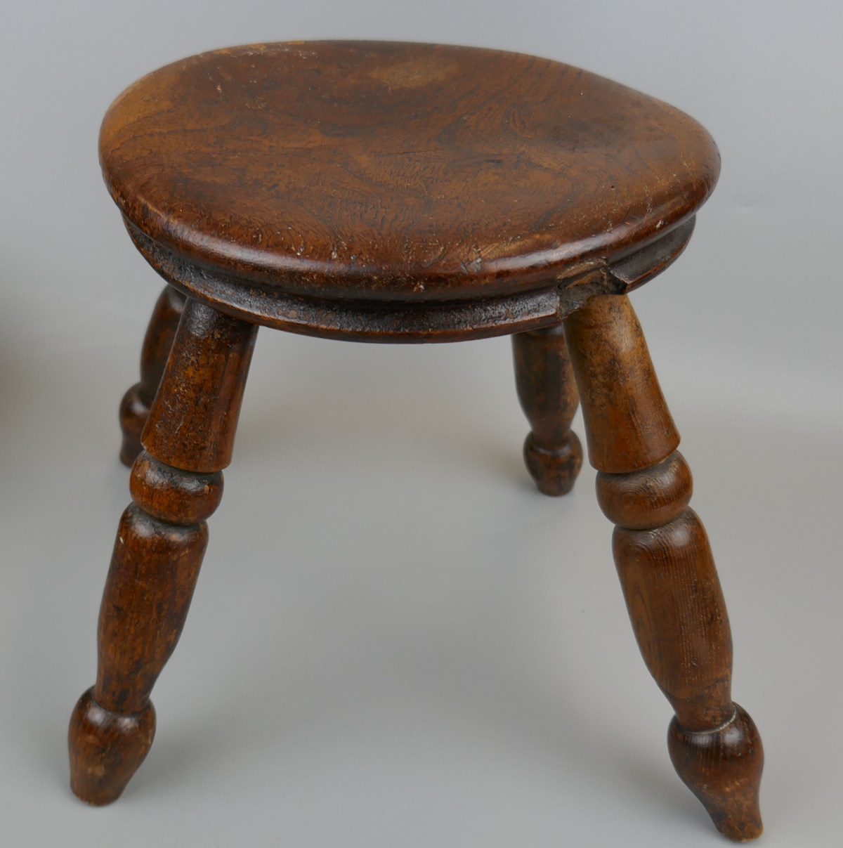 Antique elm milking stool