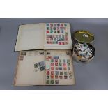 Stamps - 2 albums and tin, all Wworld to include interesting Japanese overprints