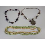 Collection of vintage crystal and glass necklaces