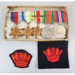 Collection of WWII medals & badges