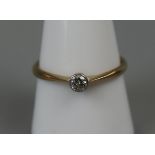 18ct gold diamond solitaire ring (Size R½)