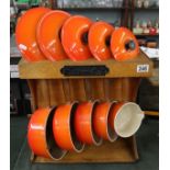 Set of 5 Le Creuset saucepans with storage unit