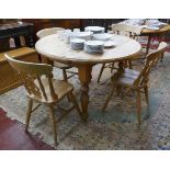 Pine drop leaf dining table together with set of 4 beechwood chairs