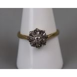 18ct gold diamond daisy ring (Size R½)