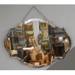 Shaped & bevelled glass wall mirror