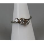 Fine 18ct white gold 3 stone diamond twist ring (Size N½)