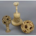 2 Ivory puzzle balls on stands