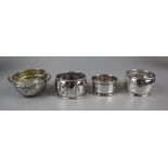 3 hallmarked silver napkin rings and white metal condiment pot
