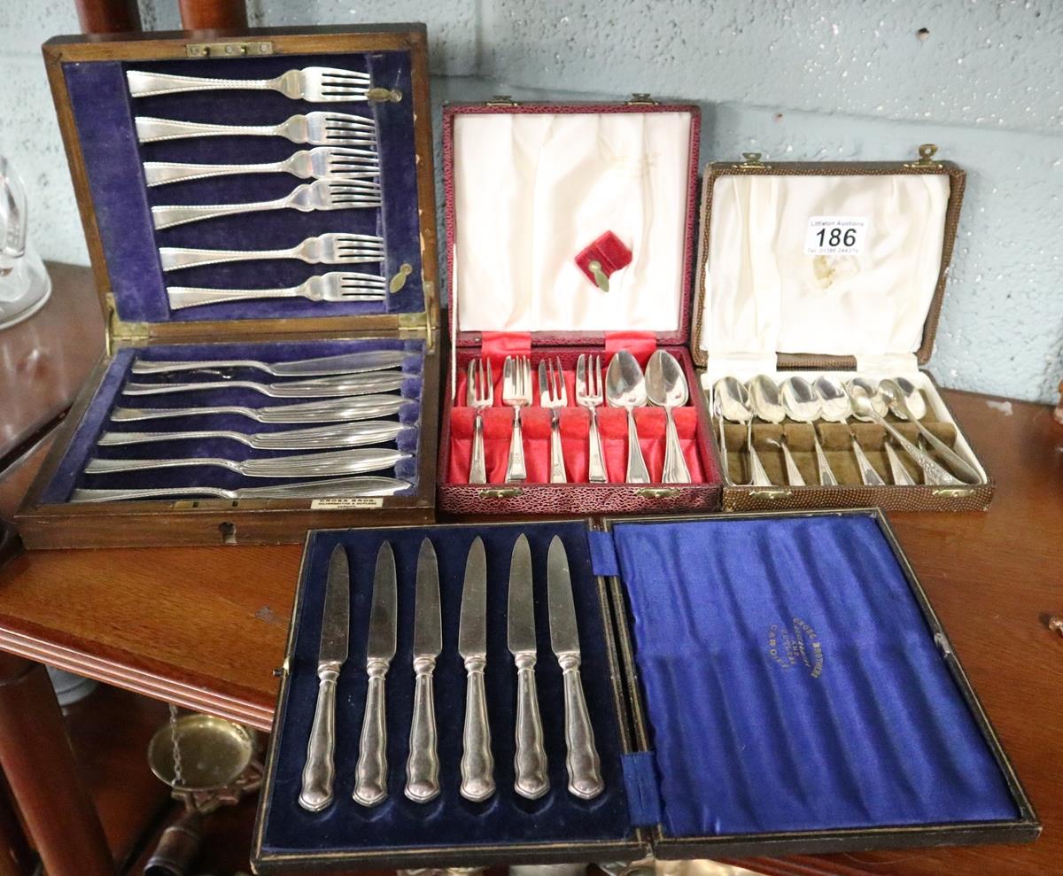 Collection of cased cutlery to include hallmarked silver handled examples