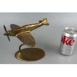 Brass aeroplane on stand