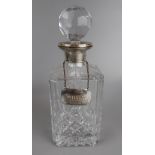 Hallmarked silver collared decanter with hallmarked silver whisky label