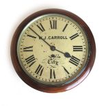 A late 19th/early 20th century mahogany fusee wall clock, the dial signed 'W.J Carroll, City', dia.