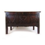 An 18th century and later oak coffer,