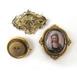 A 19th century yellow metal portrait brooch together an ornate yellow metal and enamel brooch and
