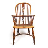 An early 19th century ash and elm Windsor chair,