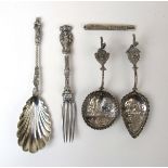 A Victorian silver apostle spoon together with ornate Victorian silver fork,