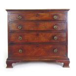 A George III mahogany dressing chest of four long drawers on ogee bracket feet,