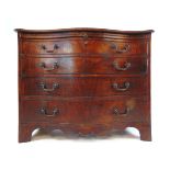 A George III mahogany serpentine commode chest of drawers,