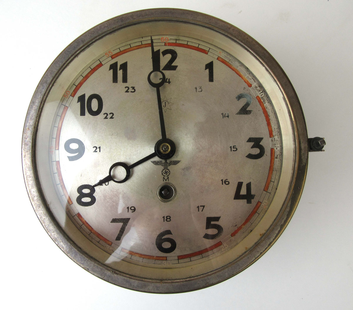 A German Third Reich type naval bulkhead clock, the silvered dial signed Junghans with red markers, - Image 2 of 4