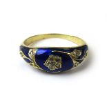 A Victorian yellow metal, blue enamel and diamond ring having a naturalistic setting.