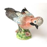 A Beswick model of a Jay having flowers to base (second version), No.