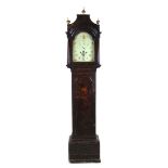 An early 18th century black chinoiserie longcase clock,