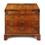 An early 18th century style walnut bureau,