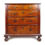 A late 17th century walnut and boxwood strung chest of two short over three long drawers on later