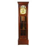 An Edwardian mahogany weight driven tube chiming longcase clock,