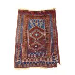 A handwoven Turkish prayer rug, the multi line border surrounding the niche with two diamonds,