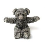 An Elizabeth II silver model of a Teddy Bear. Hallmarked for Birmingham 1995. Filled, h.