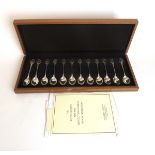 A set of twelve RSPB silver collector spoons having bird cameo finials.