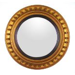 A Regency gilt wood convex mirror,