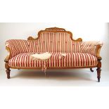 An Edwardian walnut, amboyna, boxwood strung and marquetry settee,