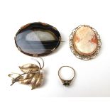A 9ct gold mounted carved shell cameo brooch together with a yellow metal mounted agate brooch,