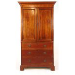 An 18th century and later mahogany linen press,