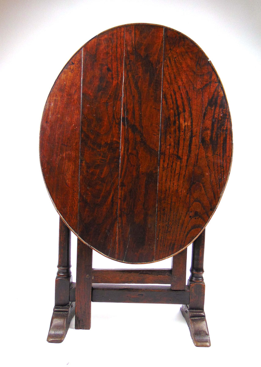 A late 17th century and later oak 'coaching table',