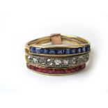 An early 20th century yellow metal, diamond, sapphire and ruby ring,