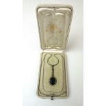 A 19th century yellow/white metal green stone and paste pendant,