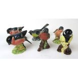 A collection of six Beswick birds to include a Grey Wagtail (No.1041), Bullfinch (No.