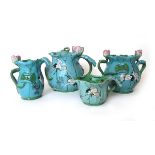 An early 20th century Japanese pottery tea set modelled in the form of lily pads with further