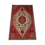 A handwoven Caucasian rug,