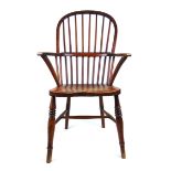 A 19th century elm, ash and beech Windsor chair, the comb back on turned legs and stretchers, h.