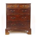 An 18th century and later oak chest of two short over three long drawers on bracket feet, h.