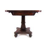 A 19th century mahogany tea table,