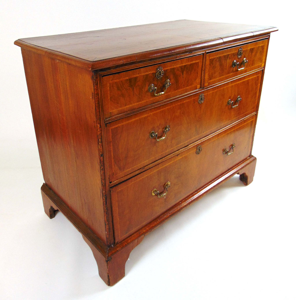 An early 18th century and later walnut and banded chest of two short over two long drawers on - Image 2 of 2