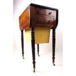 An early 19th century mahogany work table,