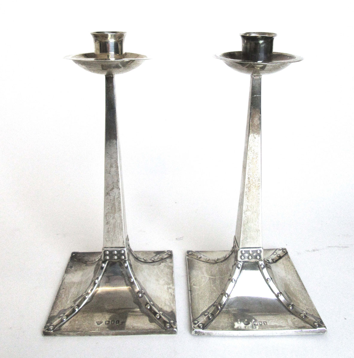 A pair of Edwardian Arts and Crafts silver candlesticks, - Image 2 of 13