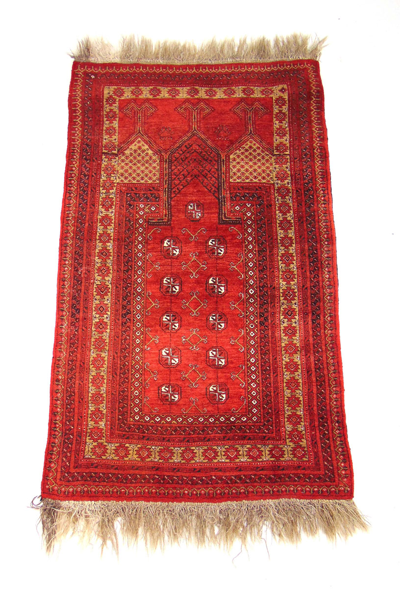 A handwoven Afghan prayer rug, the multi line border surrounding the red ground niche with octagons, - Image 2 of 2