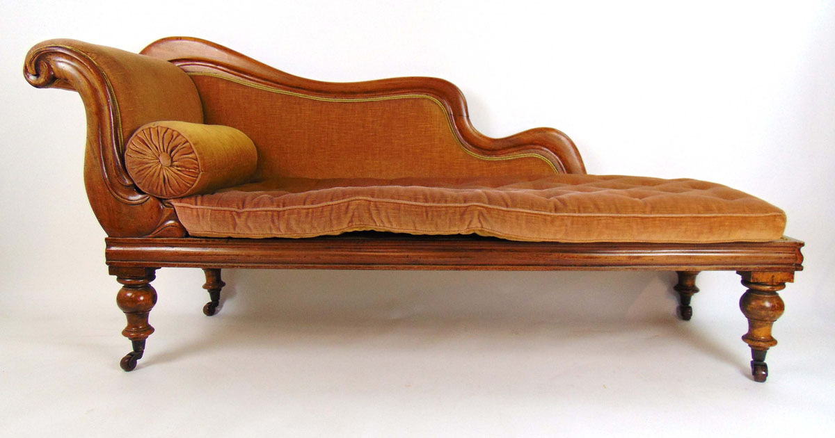 A Victorian mahogany chaise longue upholstered in a cut peach/gold fabric on turned legs, h.